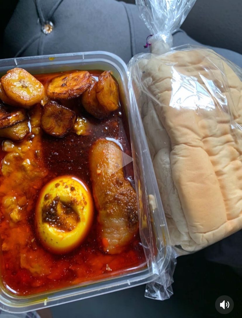 Ewa agoyin with bread, plantain and Stew